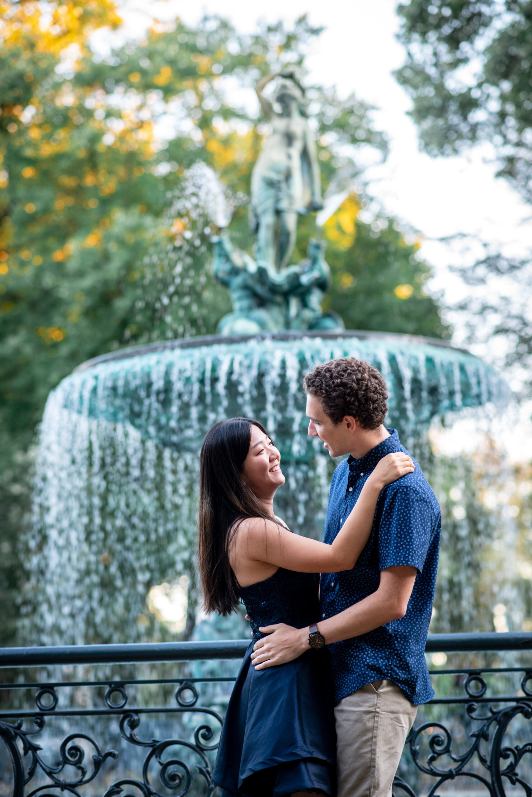 Couple dances by fountain