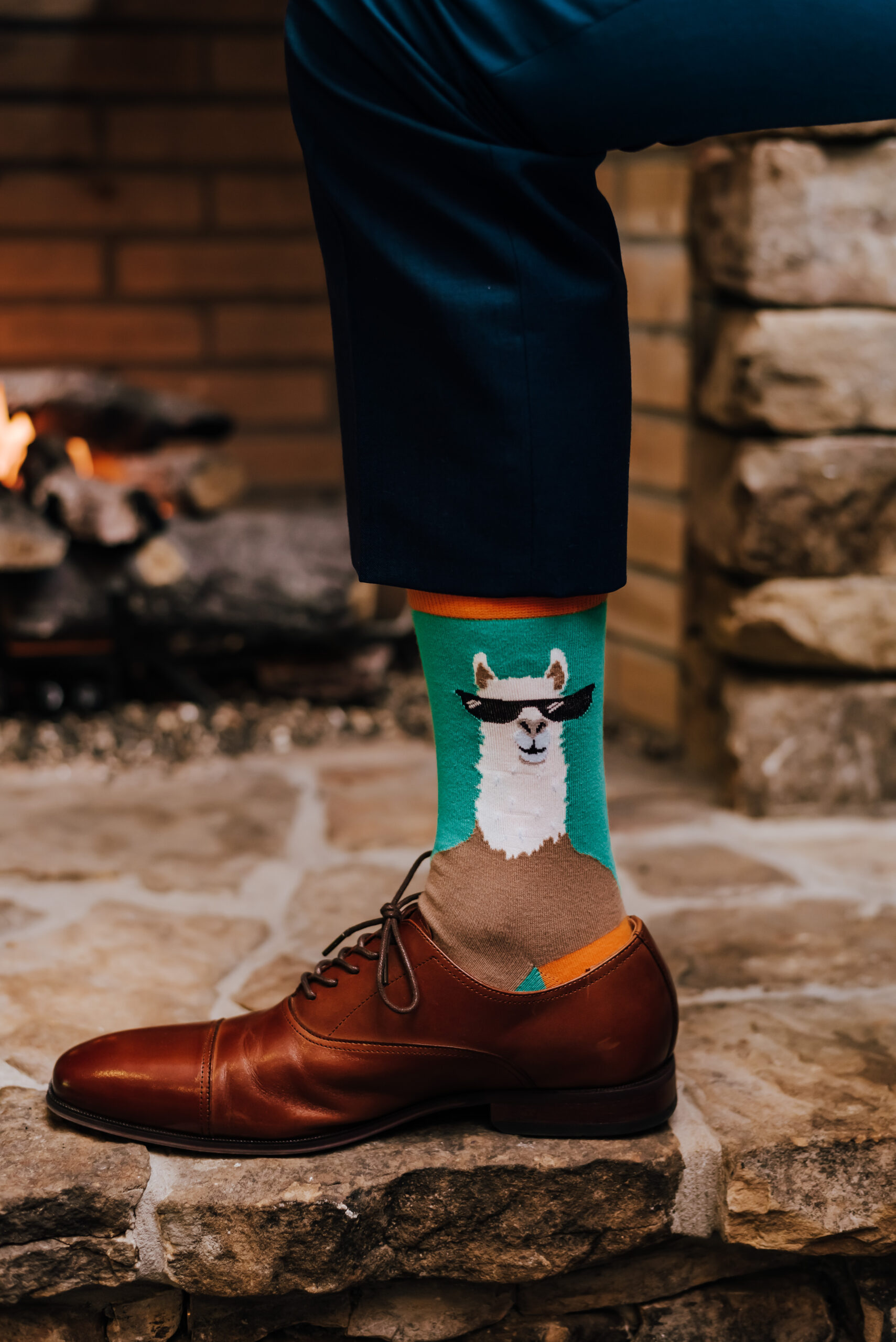 Closeup of groom's funny llama socks
