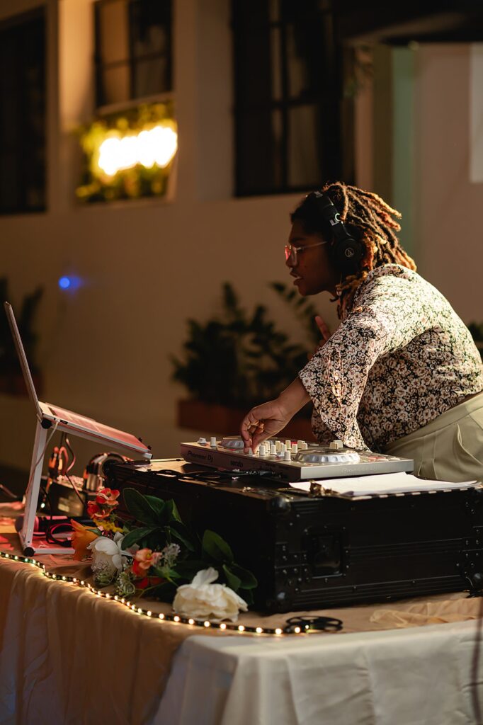 A DJ spins at a wedding reception in Louisville.