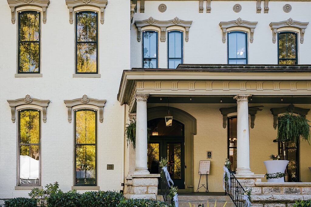 A historic house with a Spanish-style facade serves as a wedding venue.