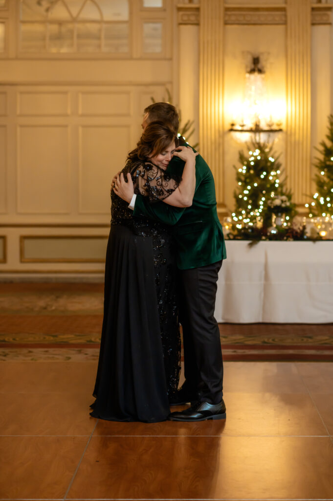 Matthew embraces his mother for their mother-son dance