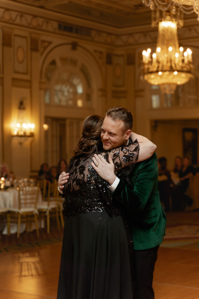 Matthew embraces his mother for their mother-son dance