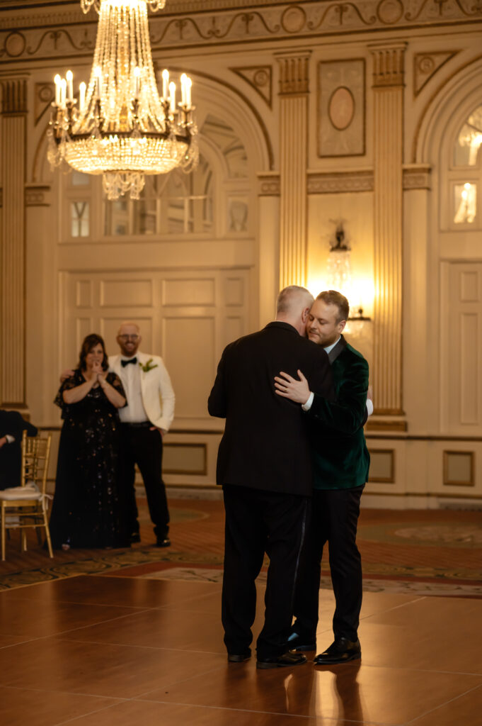 Matthew and his father share a dance, as mom and his new groom look towards them lovingly