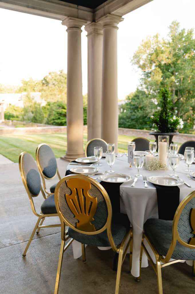 Reception tables on the back patio of Gardencourt